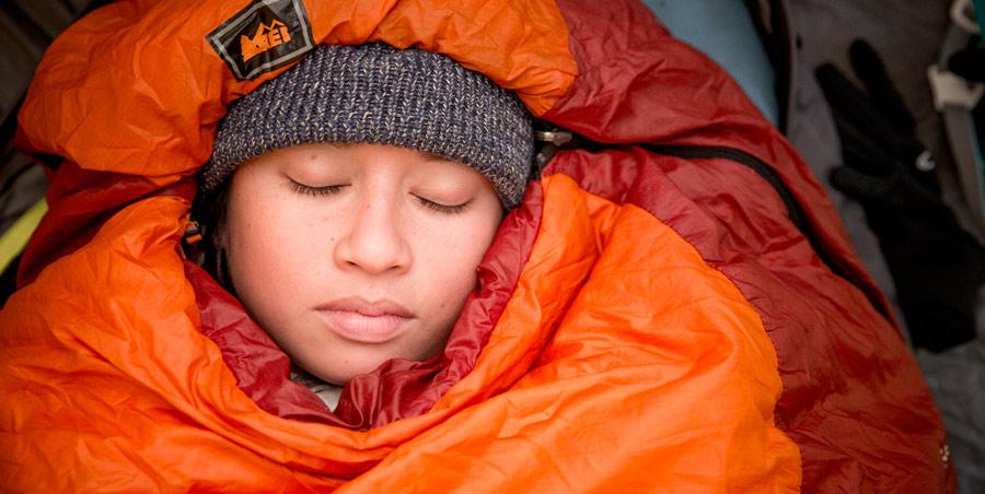 Never cover your mouth and nose completely with your sleeping bag