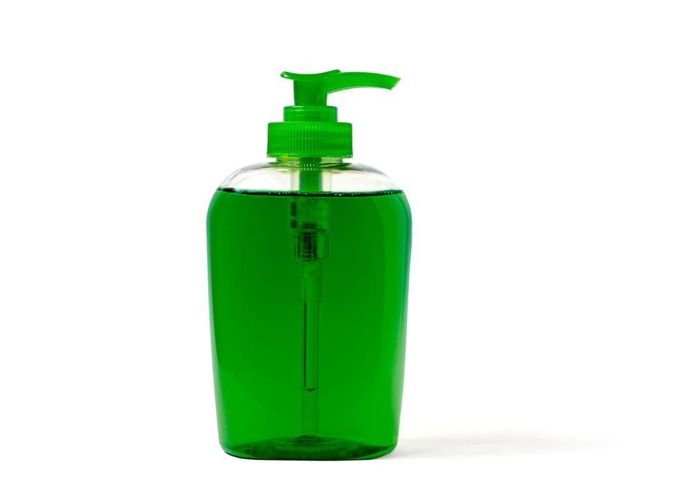 plastic bottle with green liquid on a white background