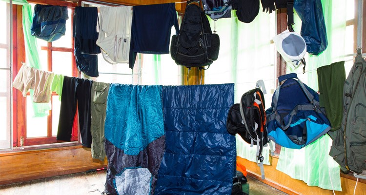 One way to store your sleeping bag is by hanging i