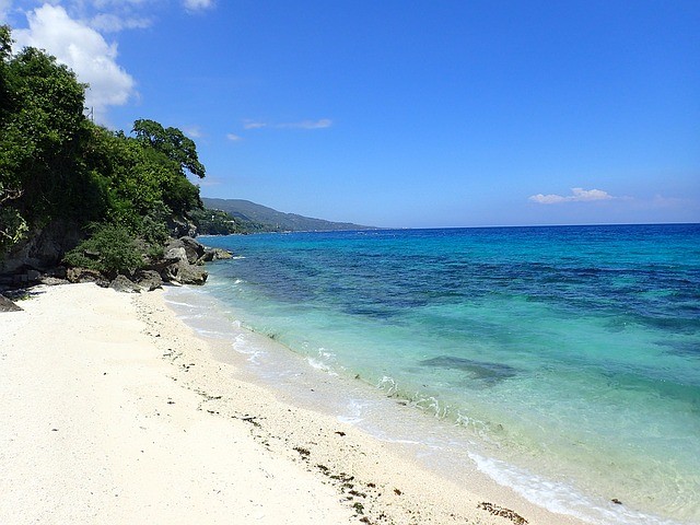 The quiet and clean white sand beaches of Oslob, Cebu.