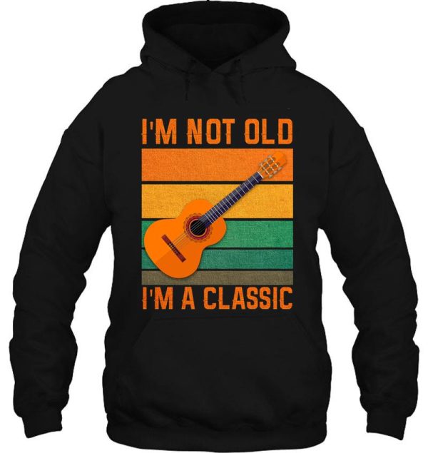 guitar player playing acoustic guitar hoodie