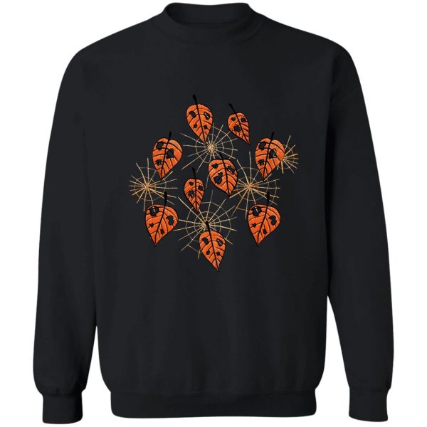 orange leaves with holes and spiderwebs sweatshirt